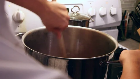 Making hot supper Stock Footage 97599272