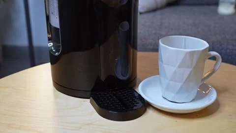 Making Hot Tea With Modern Water Dispenser Stock Footage 338127568