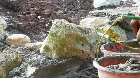 Making a house foundation Stock Footage 312127103