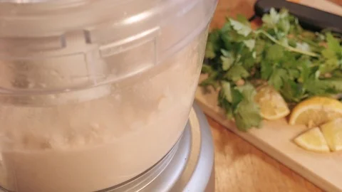 Making Hummus in a Food Processor Stock Footage 77561421