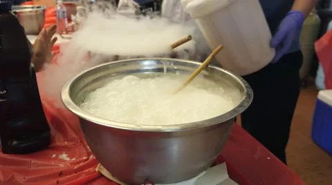 Making ice cream with liquid nitrogen at a science fair. Stock Footage 50030317