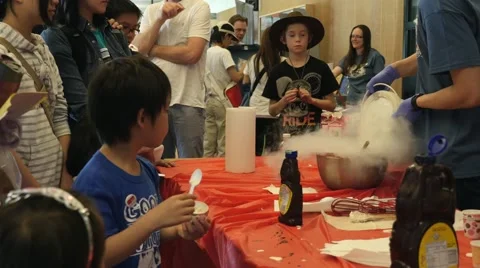 Making ice cream with liquid nitrogen at a science fair. Stock Footage 50036638