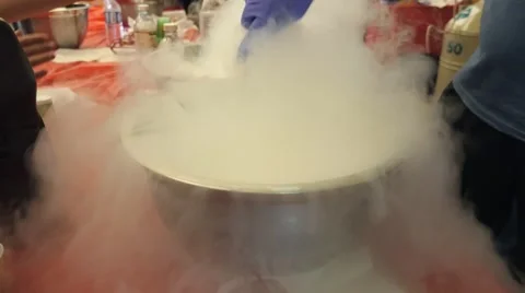 Making ice cream with liquid nitrogen at a science fair. Stock Footage 50037004