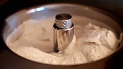 Making ice cream in slow motion Stock Footage 153935990