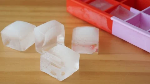 Making ice cubes in a tray at home Video stock 341224585