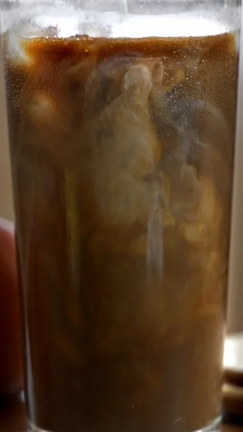 Making ice latte coffee drink Stock Footage 217378014