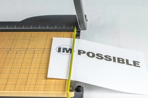 Making impossible possible paper cutter Stock Photos