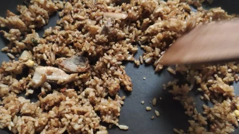Making Indonesian Fried Rice Stock Footage 303120795