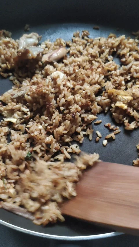 Making Indonesian Fried Rice Stock Footage 303120820
