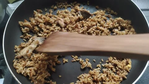 Making Indonesian Fried Rice Stock Footage 303120832