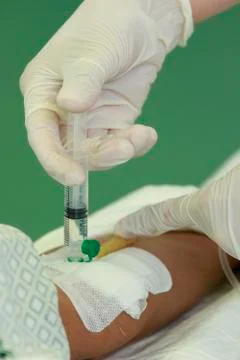 Making an injection close-up Фото