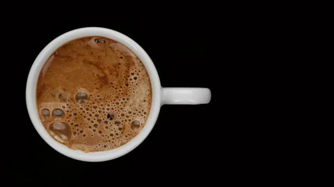 Making instant black coffee in white cup, black background Stock Footage 158439132
