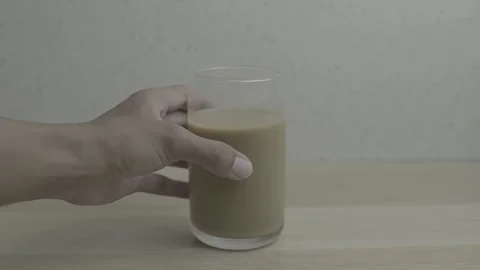 Making instant iced milk coffee Stock Footage 300875868
