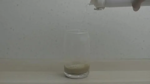 Making instant iced milk coffee Stock Footage 300876816