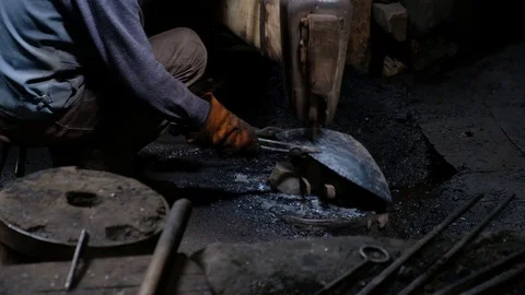 Making of iron bell in blacksmith’s workshop. Stock Footage 130145009