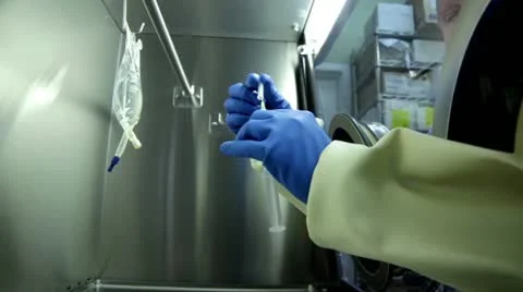 Making an IV Bag in a Hood Video stock 12737385