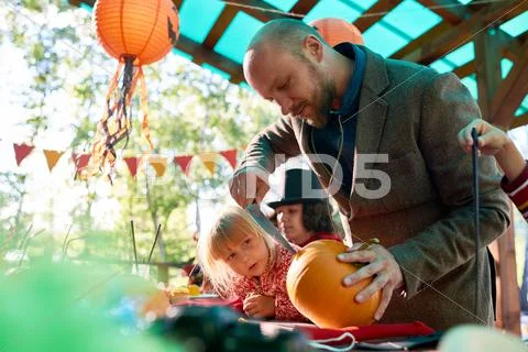 Making jack-o-lantern Stock Photos