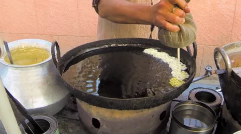 Making Jalebi in Timelapse Stock Footage 59723577
