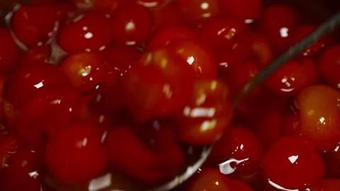 Making jam, fruit jam. Cook plums in sugar, dessert. Close-up, shallow depth  Stock Footage 157573503