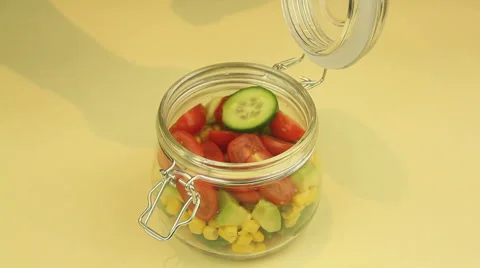 Making A Jar Of Salad Stock Footage 43680091