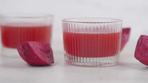 Making juice from fresh beets in the kitchen Stock Footage 340729345