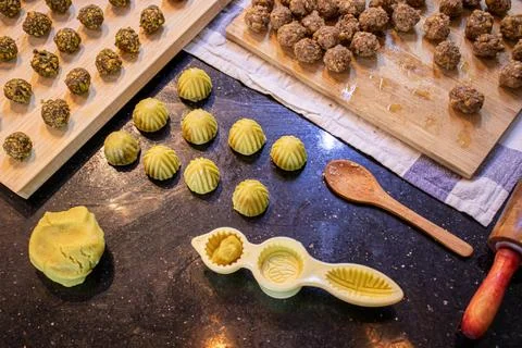 Making keto eid kahk using almond dough pistachio filling and walnut filling Stock Photos