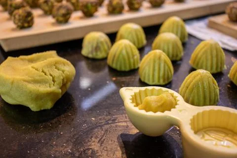 Making keto eid kahk using almond dough pistachio filling and walnut filling Stock Photos