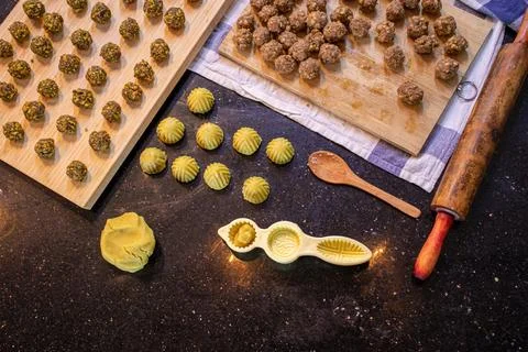 Making keto eid kahk using almond dough pistachio filling and walnut filling Stock Photos