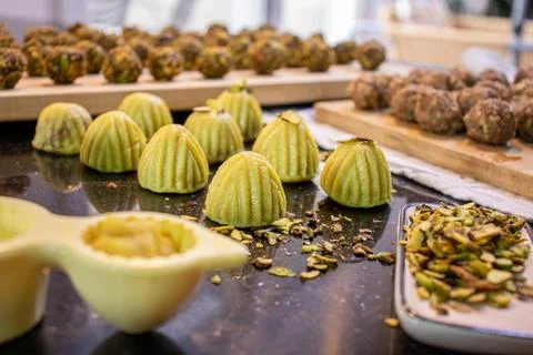 Making keto eid kahk using almond dough pistachio filling and walnut filling Stock Photos