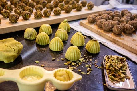 Making keto eid kahk using almond dough pistachio filling and walnut filling Stock Photos