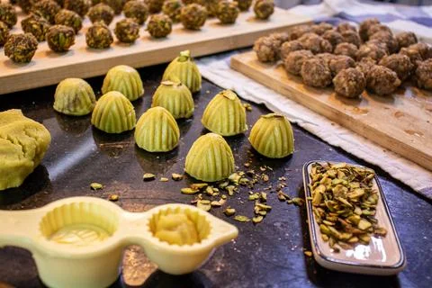 Making keto eid kahk using almond dough pistachio filling and walnut filling Stock Photos