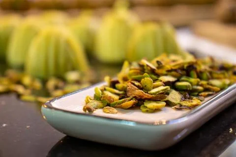 Making keto eid kahk using almond dough pistachio filling Stock Photos