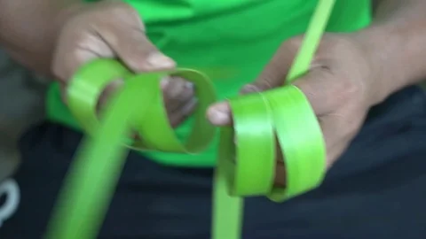 Making Ketupat Cover for Eid el Fitr Celebration Stock Footage 108301812