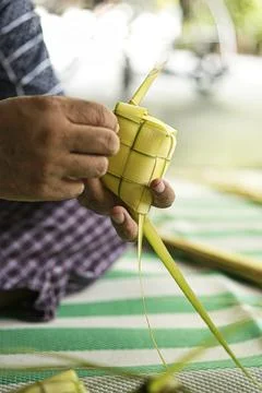Making the ketupat Stock Photos