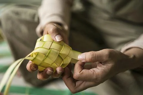 Making the ketupat Stock Photos