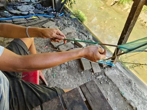 Making a kite from a bamboo frame and paper Stock Photos