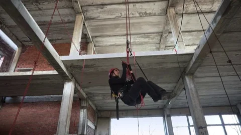 Making knot with carabiner Stock Footage 76315485