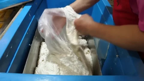 Making Korean Fish Cake Dough in Food Factory Stockbeeldmateriaal 337372780