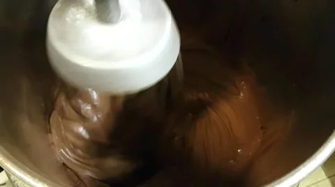 Making a large amount chocolate mousse, at a restaurant kitchen Stock Footage 62791210