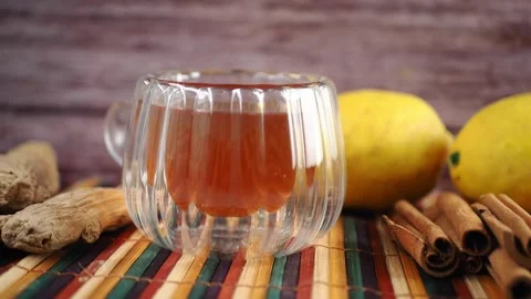 Making lemon tea with natural ingredients and spices Stock Footage 337058474
