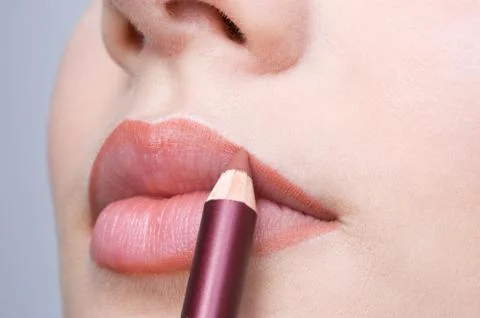 Making up lips contour Stock Photos