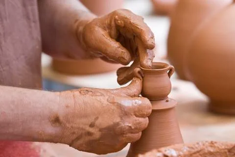 Making a little pot. Stock Photos