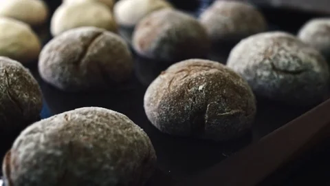 Making a loaf of bread in the bakery. Loaf of bread on the production line in Stock Footage 83293215