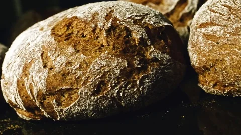 Making a loaf of bread in the bakery. Loaf of bread on the production line in Stock Footage 83294216