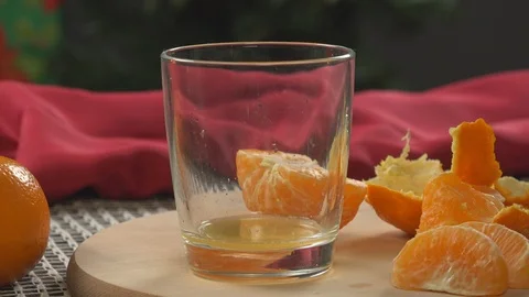 Making Mandarin Juice Stock Footage 96596381