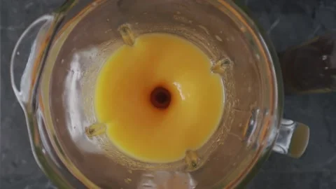 Making mango smoothie or mango juice. Healthy food concept. Stock Footage 220735527