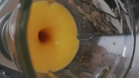 Making mango smoothie or mango juice. Healthy food concept. Stock Footage 220735528