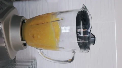 Making mango smoothie or mango juice. Healthy food concept. Stock Footage 220735554