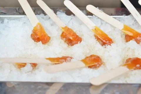 Making maple syrup on snow. Stock Photos