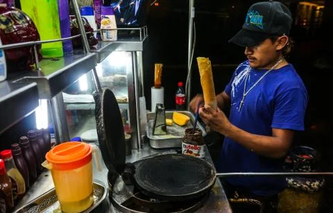 Making a marquesita Stock Photos